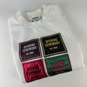 Opening Ceremony medallion patchwork sweatshirt. Size: Large